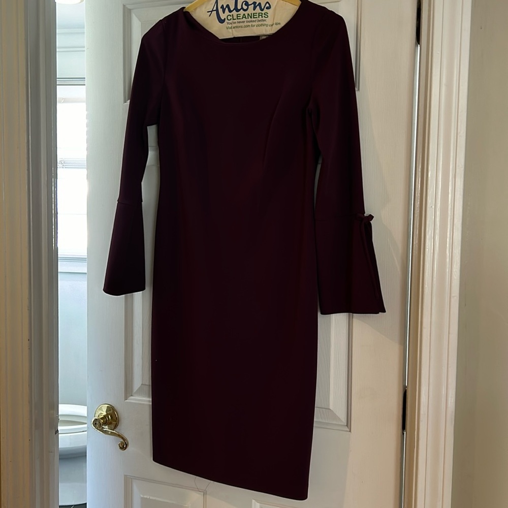 Purple dress worn once. Perfect condition. Great for a wedding or event.